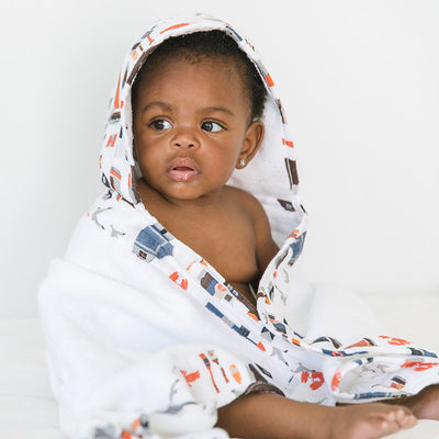 Cozy hooded towels come in fun prints with character ears to make kids smile